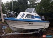 5.1 metre half cabin boat with 150hp Johnson outboard and trailer for Sale